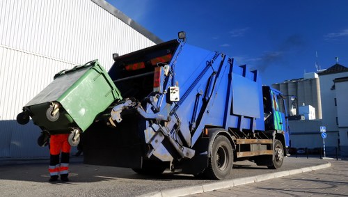 Community cleaning efforts in Sydenham with waste clearance vehicles