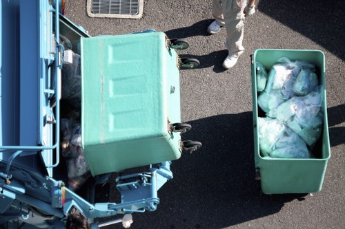 Expert handling hazardous waste during clearance in Roehampton